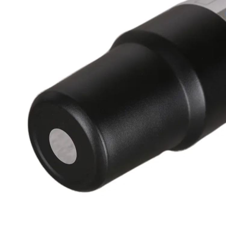 Close-up of a black cylindrical object with a metallic component