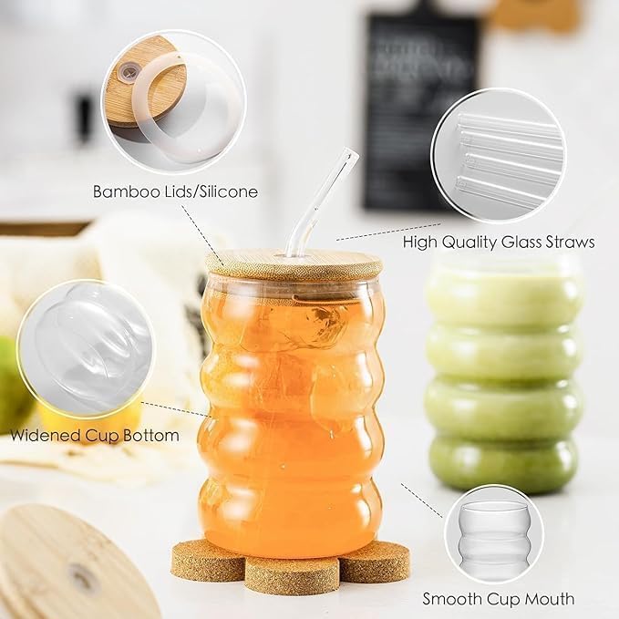 Bamboo lid, silicone lid, high quality glass straw, widened cup bottom, and smooth cup mouth features of a glass cup.