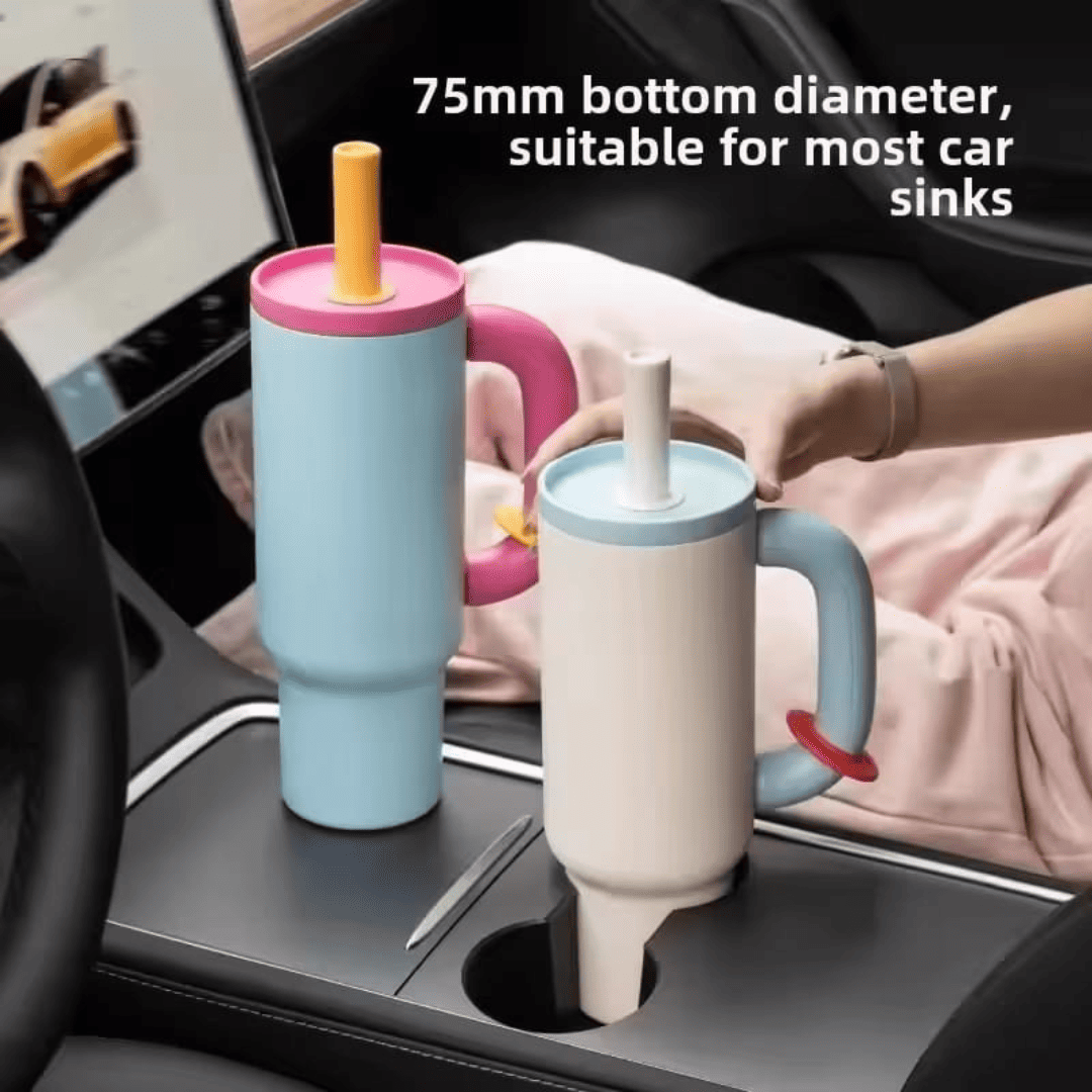 Two colorful car cup holders on a car's cup holder tray