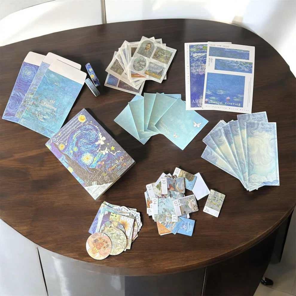 Flat lay of 164 scrapbooking supplies featuring Van Gogh’s Starry Night