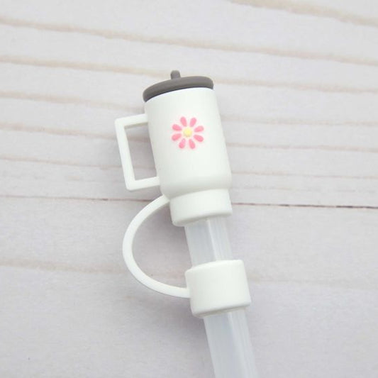 Dustproof straw cap placed on glass tumbler – silicone straw topper in daily use